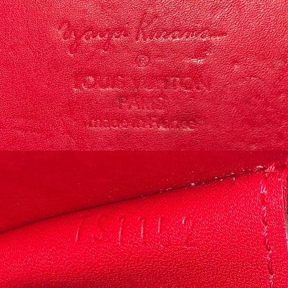 Date code of Louis Vuitton x Yayoi Kusama Porto Monnaie Chapeau Vernis Wallet Coin Purse is located inside top edge.