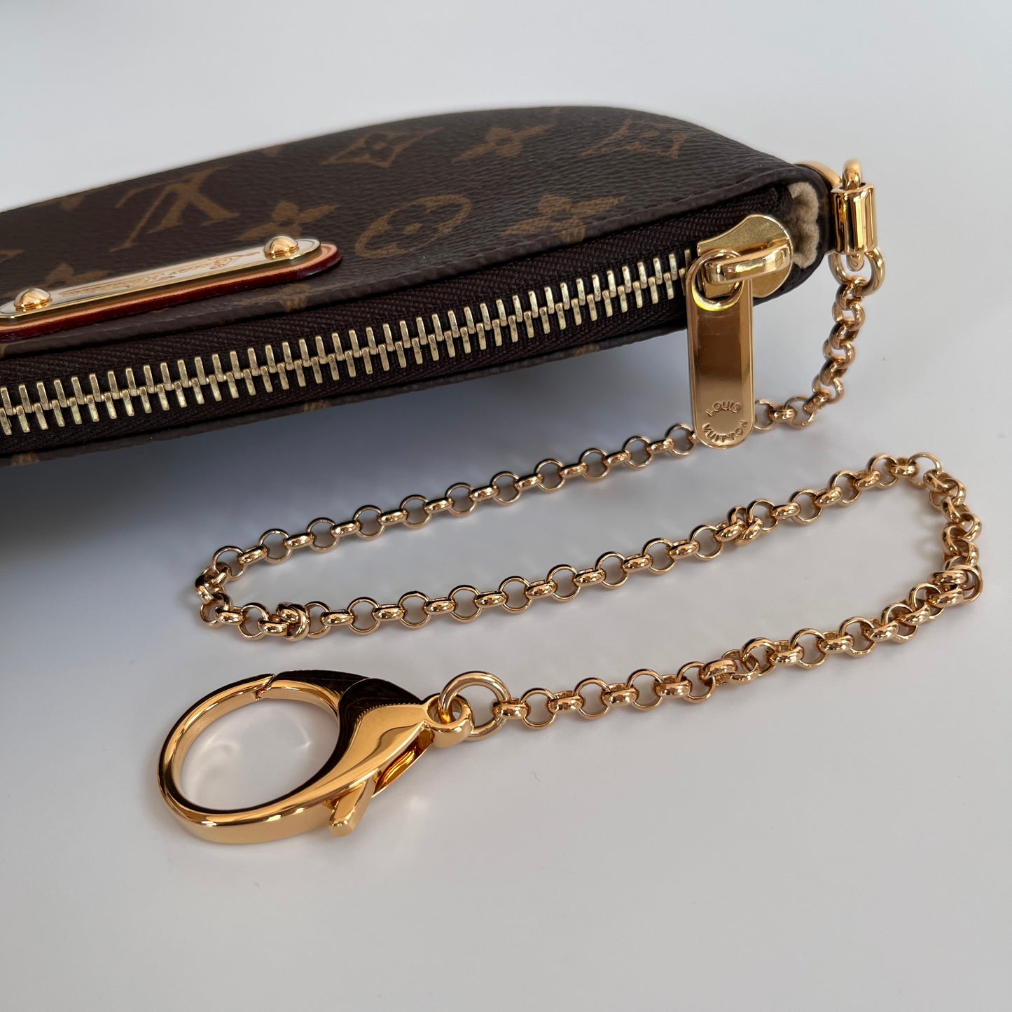 Louis Vuitton Milla MM Monogram Clutch