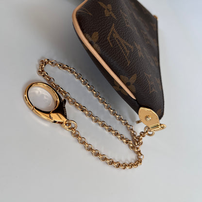 Louis Vuitton Milla MM Monogram Clutch