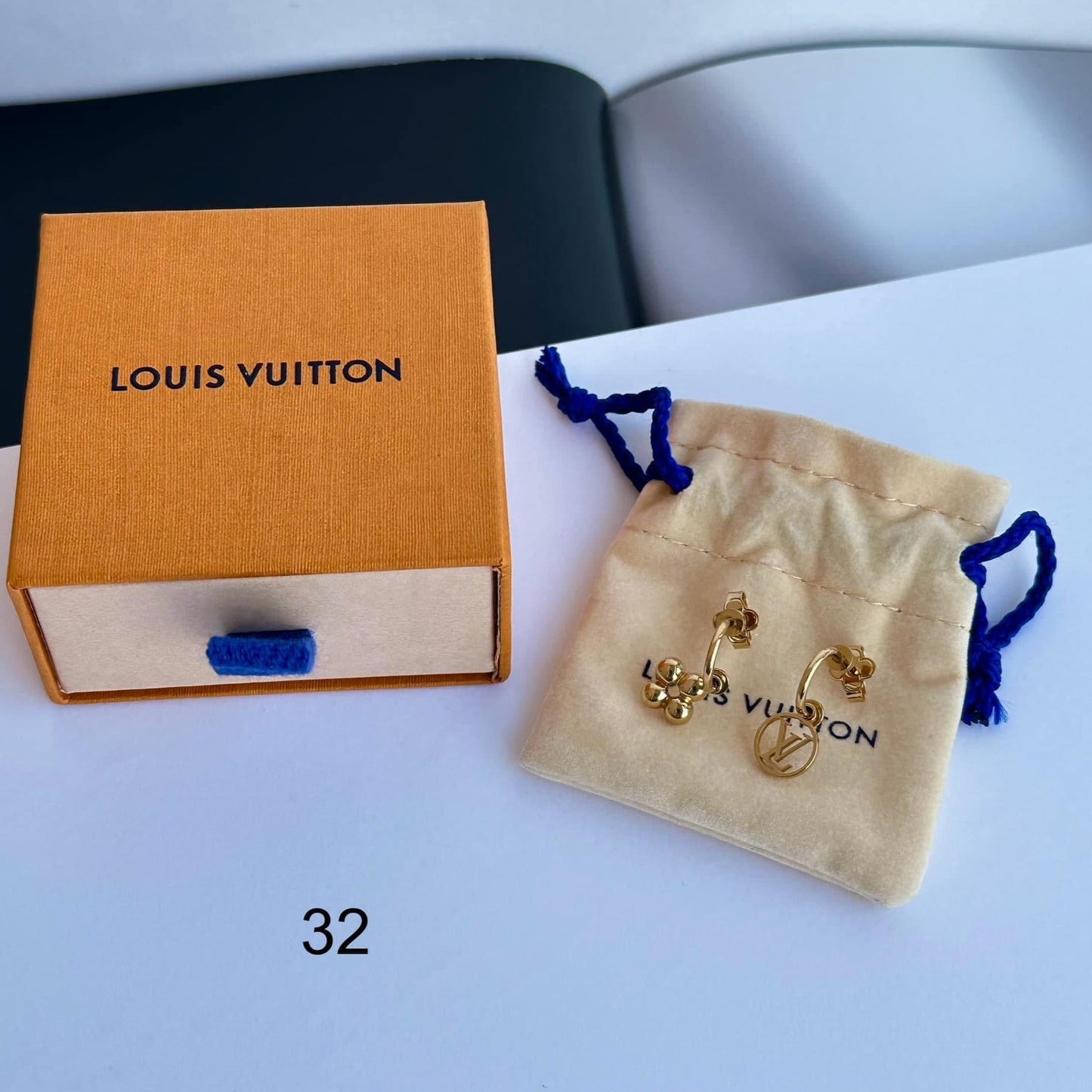 Louis Vuitton Logo Earrings