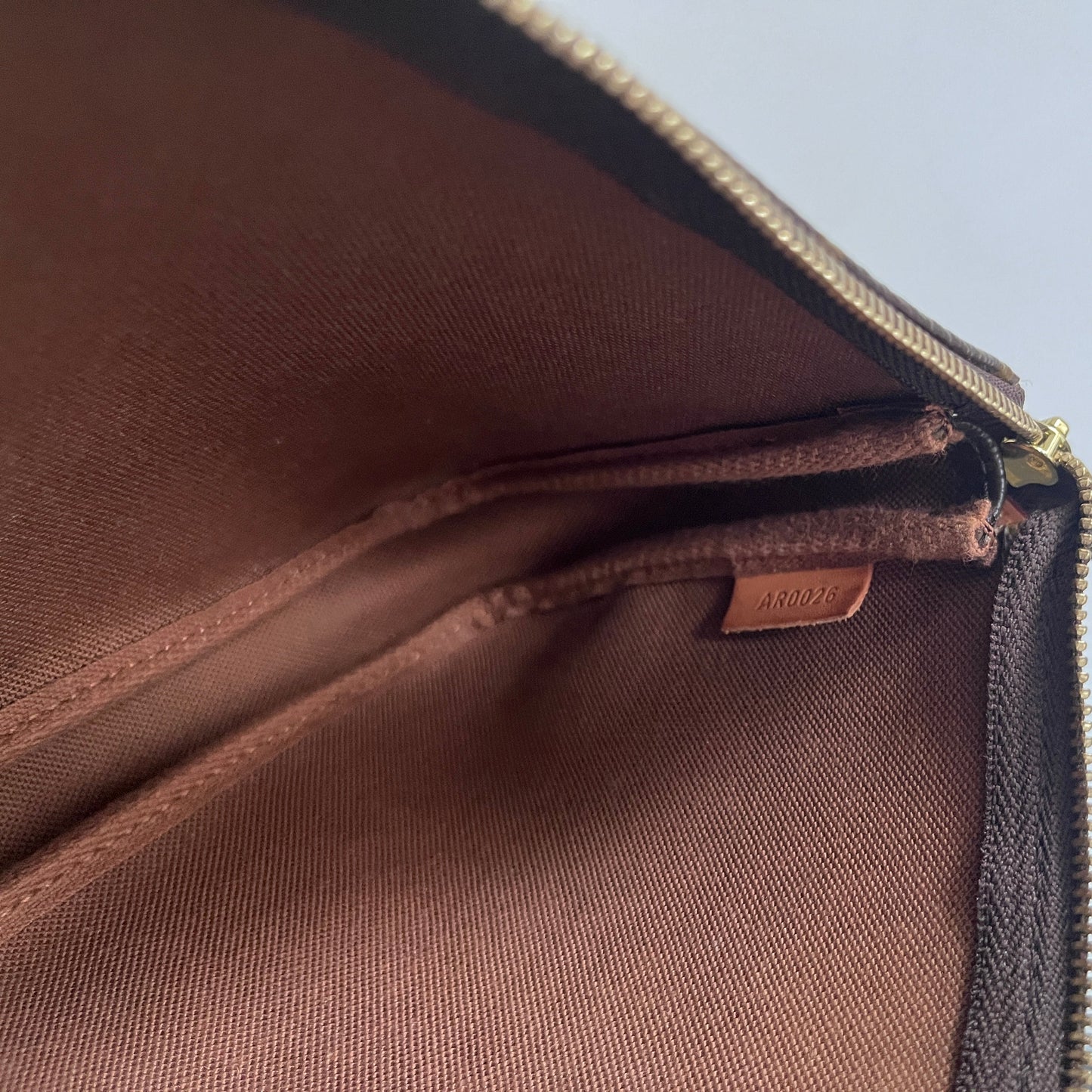 LV vintage pochette date code
